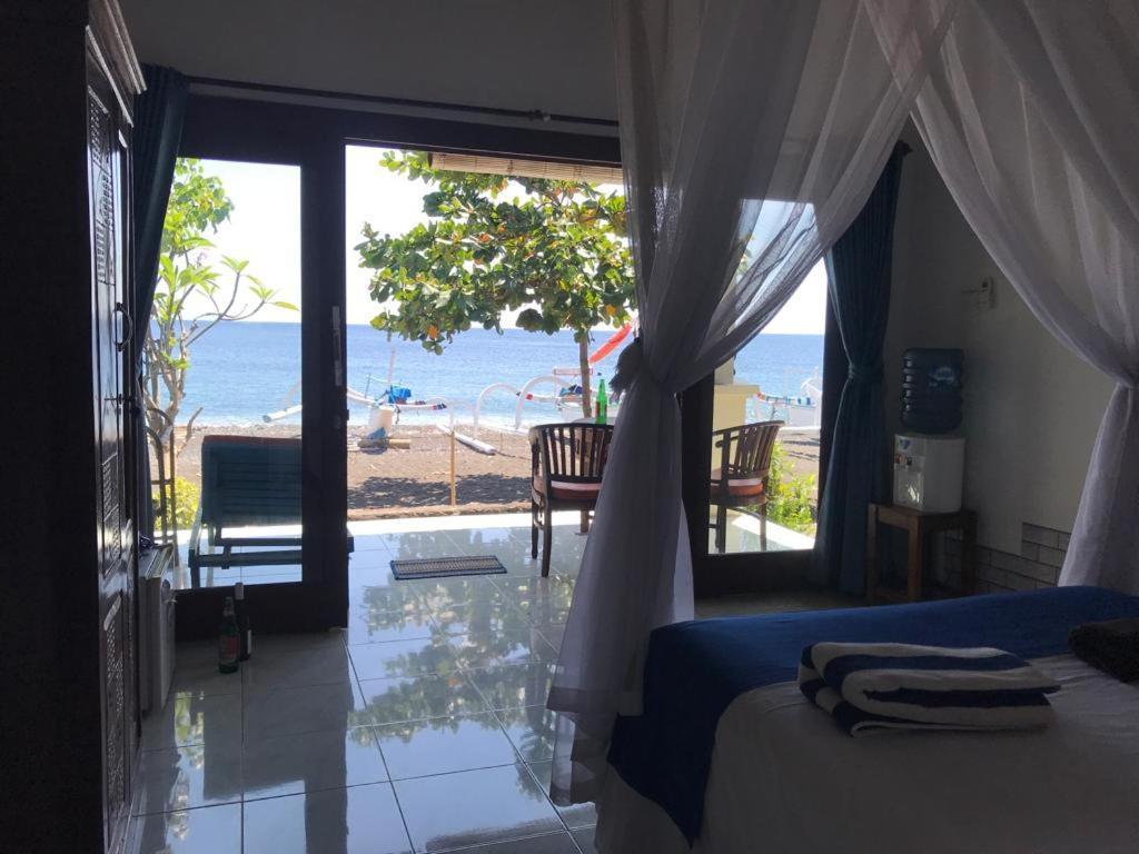 Tambun Sari Beach Homestay Амед Экстерьер фото