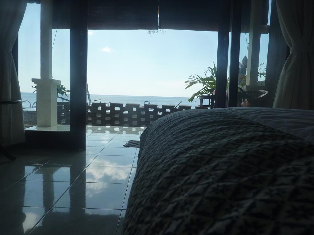 Tambun Sari Beach Homestay Амед Номер фото